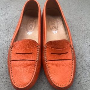 Tod's orange leather loafers